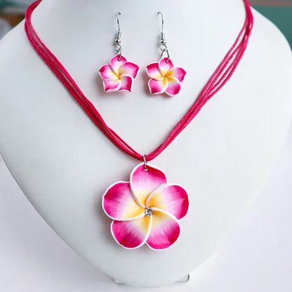Parure Bohème Fleurs Frangipanier Tressées - Collier et Boucles Plage