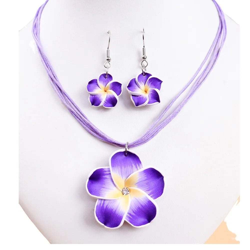 Parure Bohème Fleurs Frangipanier Tressées - Collier et Boucles Plage
