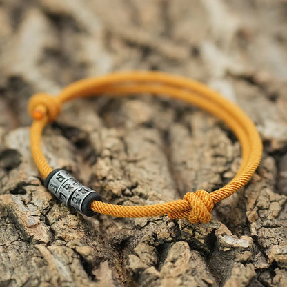 Bracelet en Corde Tressée avec Symbole Mystique - Perles Fait Main Ajustable pour Homme