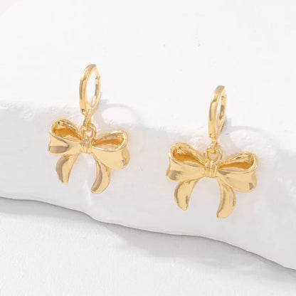 Boucles d'Oreilles Nœud Papillon – Puces Élégantes Tendance Femme