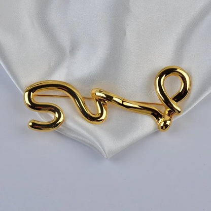 Broche Métal Dorée Irrégulière – Design Européen Moderne Tendance