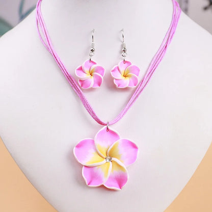 Parure Bohème Fleurs Frangipanier Tressées - Collier et Boucles Plage