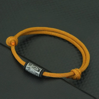 Bracelet en Corde Tressée avec Symbole Mystique - Perles Fait Main Ajustable pour Homme