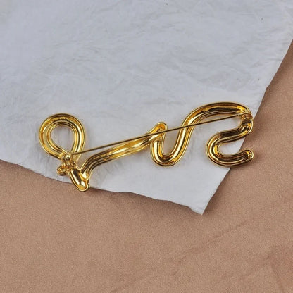 Broche Métal Dorée Irrégulière – Design Européen Moderne Tendance