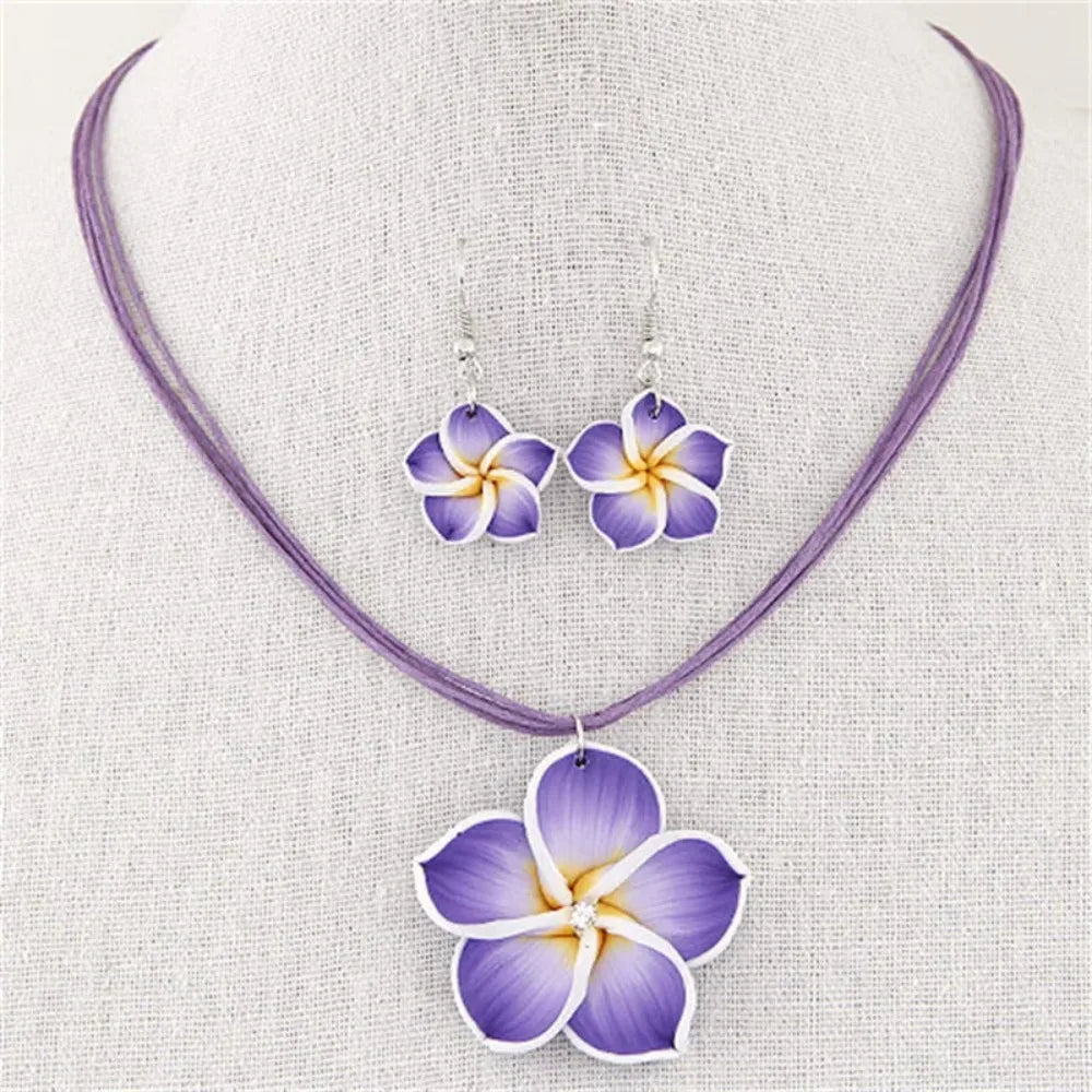 Parure Bohème Fleurs Frangipanier Tressées - Collier et Boucles Plage