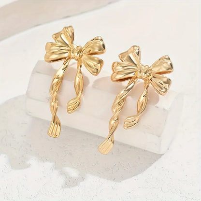 Boucles d'Oreilles Nœud Papillon – Puces Élégantes Tendance Femme