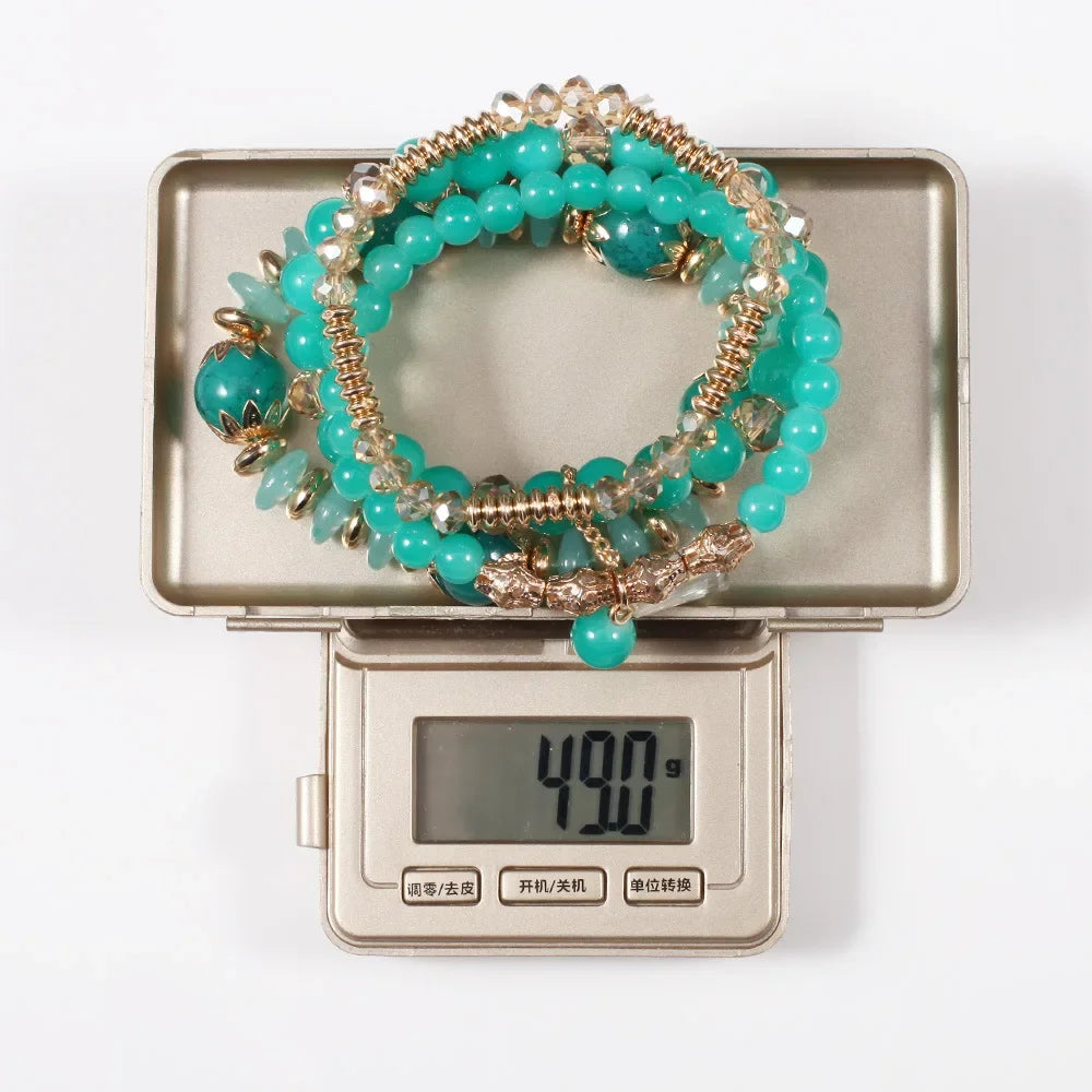 Set de 4 Bracelets Bohèmes Perles Verre Colorées - Pompons et Charms