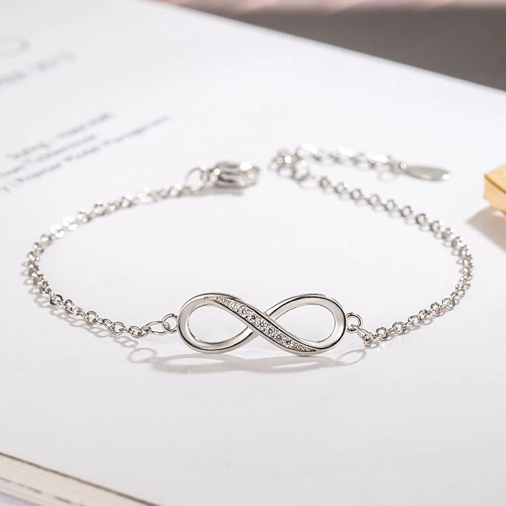 Bracelet Infini Luxe Acier Inoxydable Zircons – Ruban Möbius Argenté