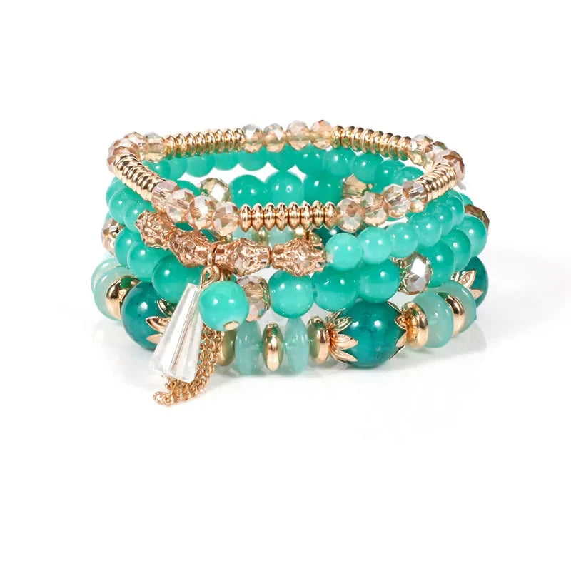 Set de 4 Bracelets Bohèmes Perles Verre Colorées - Pompons et Charms