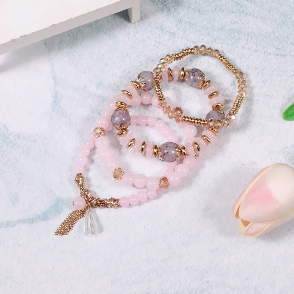 Set de 4 Bracelets Bohèmes Perles Verre Colorées - Pompons et Charms
