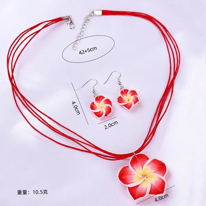 Parure Bohème Fleurs Frangipanier Tressées - Collier et Boucles Plage