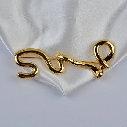 Broche Métal Dorée Irrégulière – Design Européen Moderne Tendance