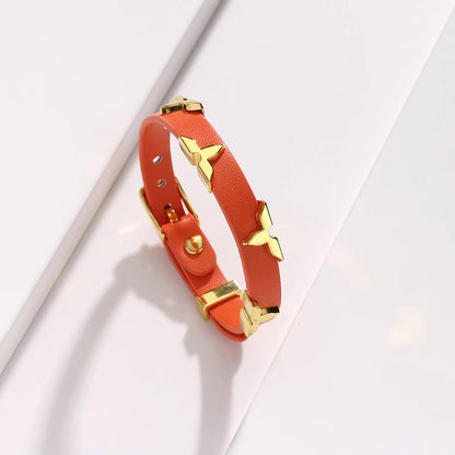 Bracelet Cuir Clous Papillon Dorés — Ajustable, Unisexe, 6 Coloris