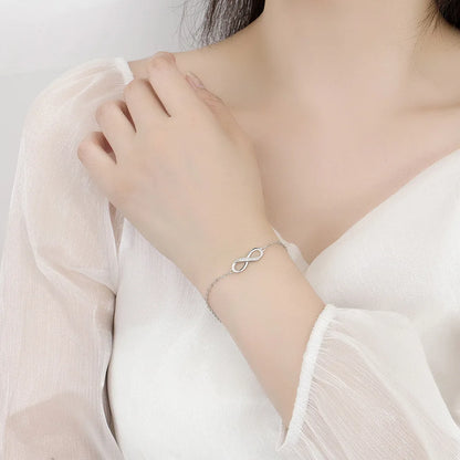Bracelet Infini Luxe Acier Inoxydable Zircons – Ruban Möbius Argenté