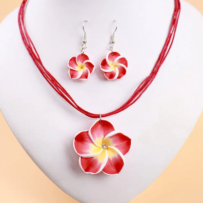 Parure Bohème Fleurs Frangipanier Tressées - Collier et Boucles Plage