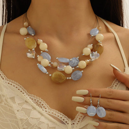 Parure Mariée Cristaux Roses et Perles Corail - Collier Goutte et Boucles